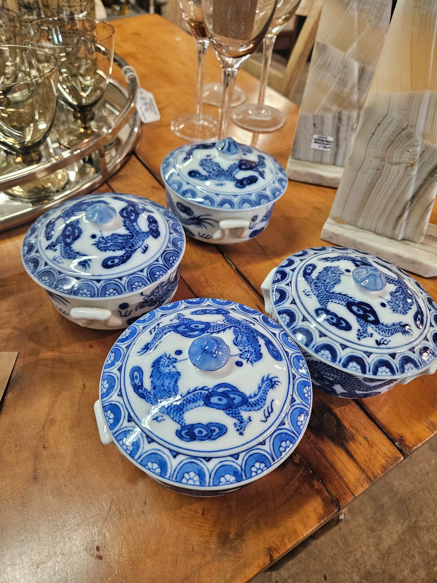 4 blue and white lidded soups